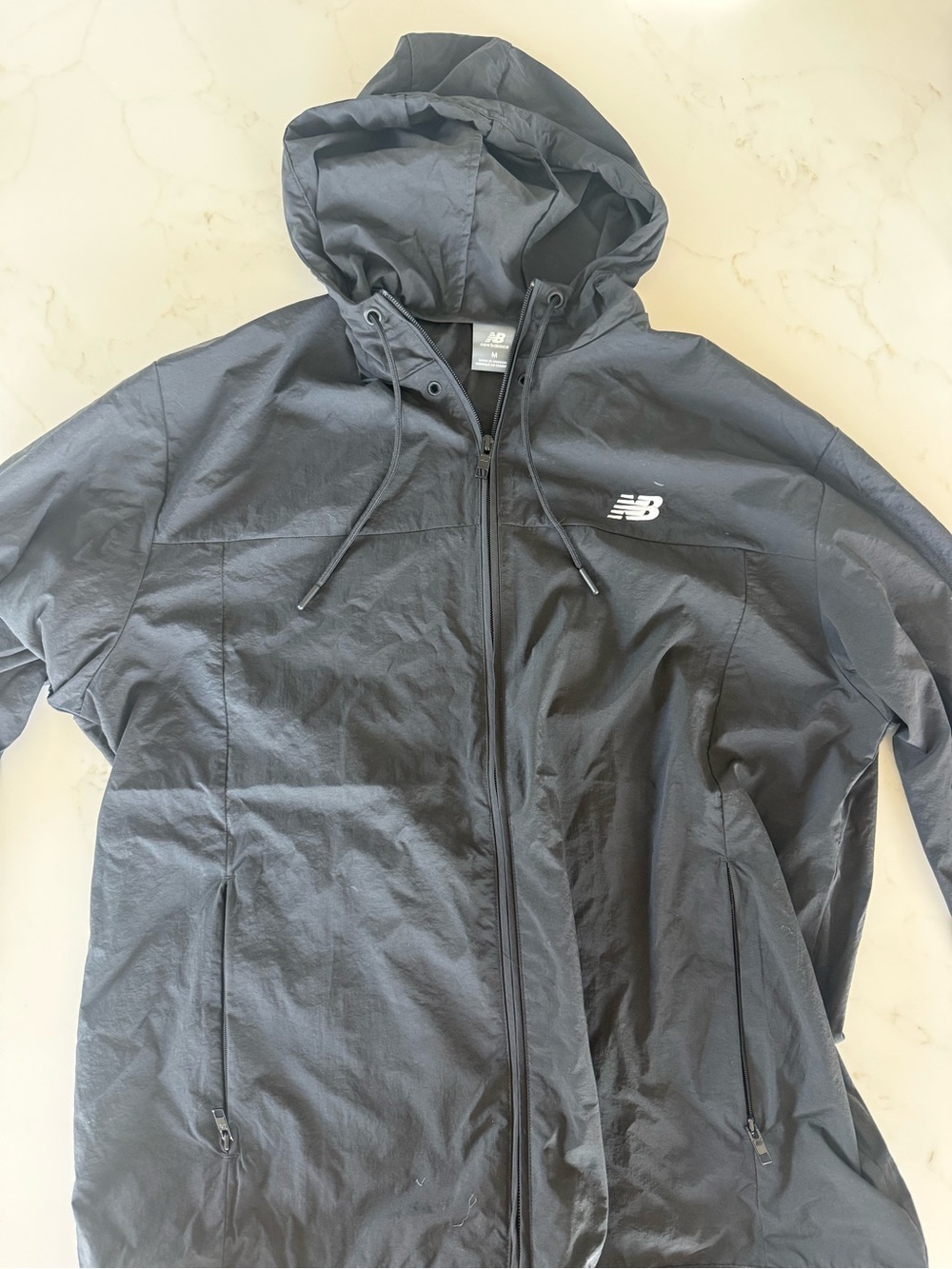 New Balance Men's Black Hooded Windbreaker with White Logo